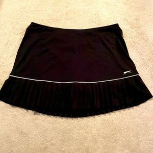 Slazenger pleated golf skirt. Black. Large.